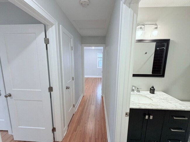 Building Photo - Spacious 4-Bedroom Home with Pond Views & EV-Ready Garage – Bloomington!!