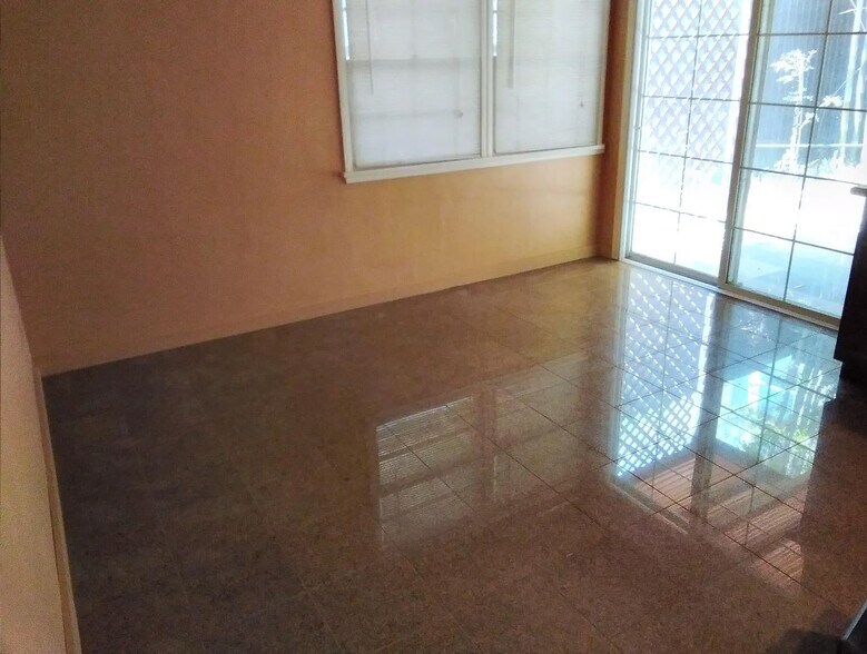 dining or living room area, sliding door to patio - 10809 Huston St