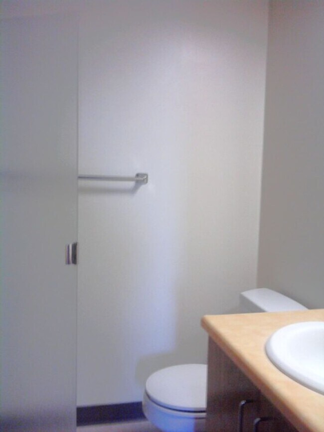 Building Photo - WHAT’S SPECIAL COMFORTABLE SHARED SPACE BRIGHT OPEN-CONCEPT LAYOUT DINING AREA SPACIOUS TOWNHOUSE...