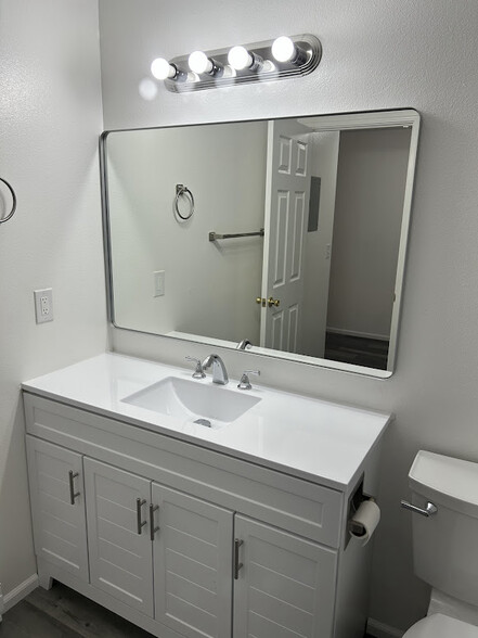 Remodeled Bath Vanity and Mirror - 3023 N Hogan St