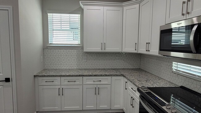 Building Photo - NEW BUILD DELUXE CONDO IN WEST MIDTOWN ATLANTA