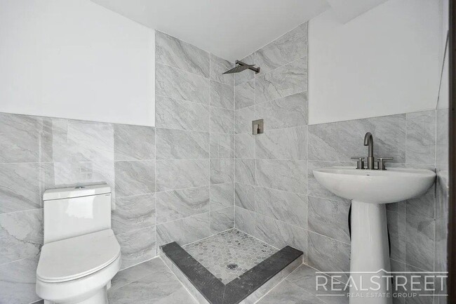 Building Photo - Timelessly Renovated Historic Triplex with...