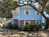 Building Photo - Walk to the Beach, 2 Bedroom, 1 Bath, Unfurnished Condo, Utilities Included!
