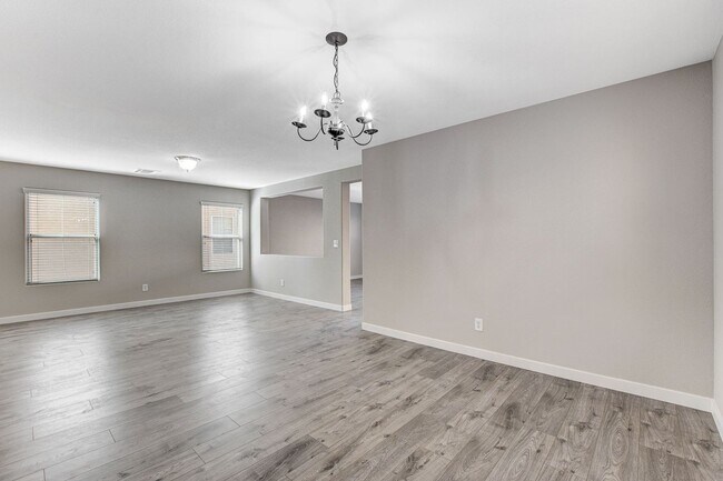 Building Photo - Spacious 3 bedroom home with large yard in...