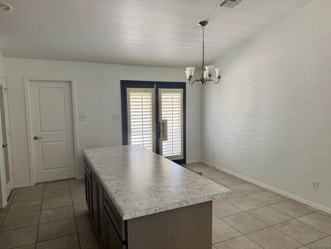 Building Photo - Three Bedroom Two Bath San Luis Home in Los Mezsquites