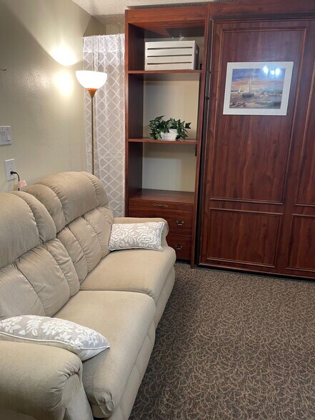 Murphy beds is up for living room space - 1499 17th St W