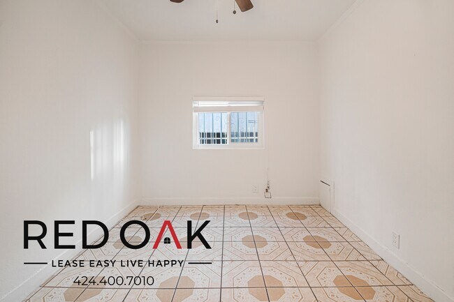 Building Photo - 7404 S Figueroa St