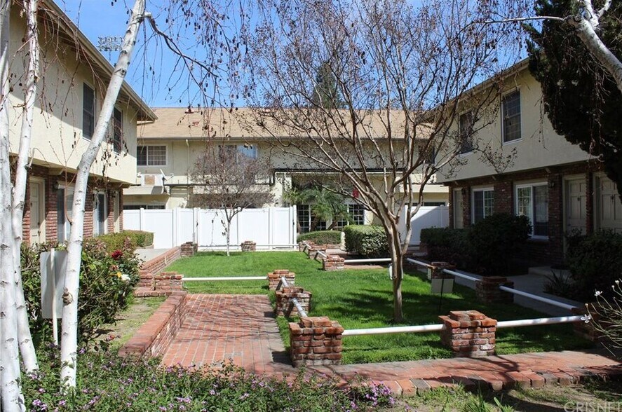 Building Photo - 10065 De Soto Ave