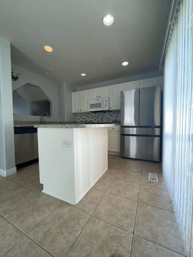 Building Photo - "Chic 3-Bed Townhouse with Scenic Views & ...