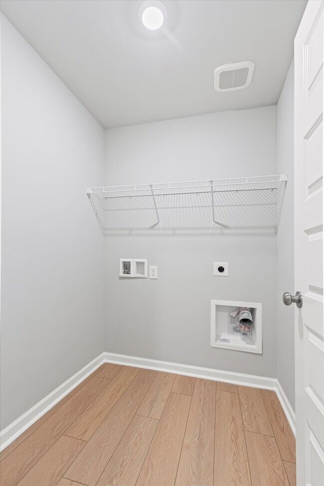 Building Photo - New 3BR Home in Whispering Woods – Modern ...