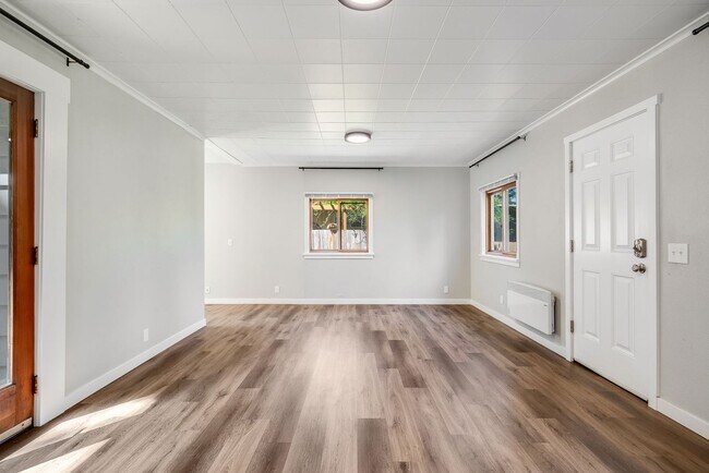 Building Photo - Charming 1 BD 1 BA cottage nestled on a be...
