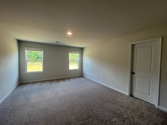 Building Photo - Beautiful New Construction Townhome in Daw...