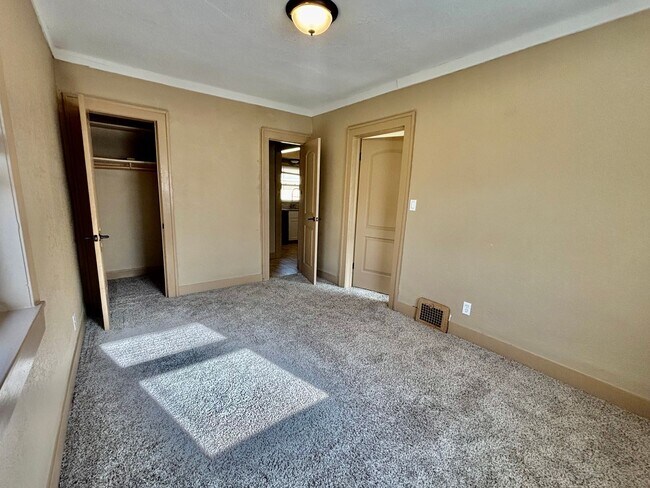 Building Photo - Spacious 2-Bedroom + Den Home with Ample Parking & Backyard!