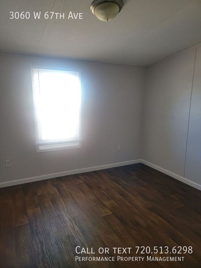 Building Photo - 3060 W 67th Ave