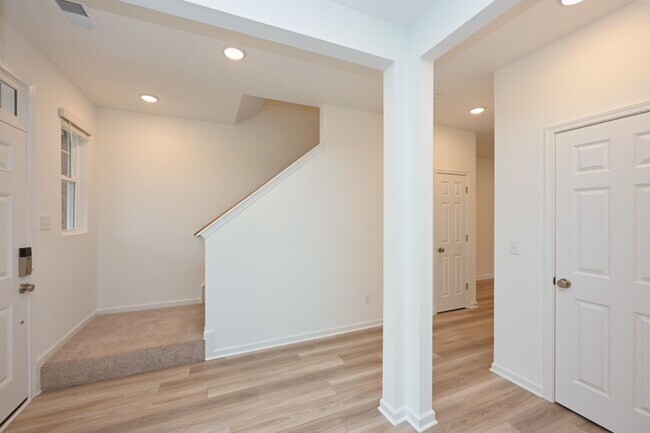 Building Photo - **BE THE LUCKY ONE TO LIVE IN THIS 2024-BUILT BRICK TOWNHOME IN THE VILLAS AT REGAL SQUARE FEATUR...