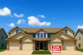 Building Photo - Eagle Creek Townhomes - Enjoy $50 off your monthly rent when you sign a 15-month lease.