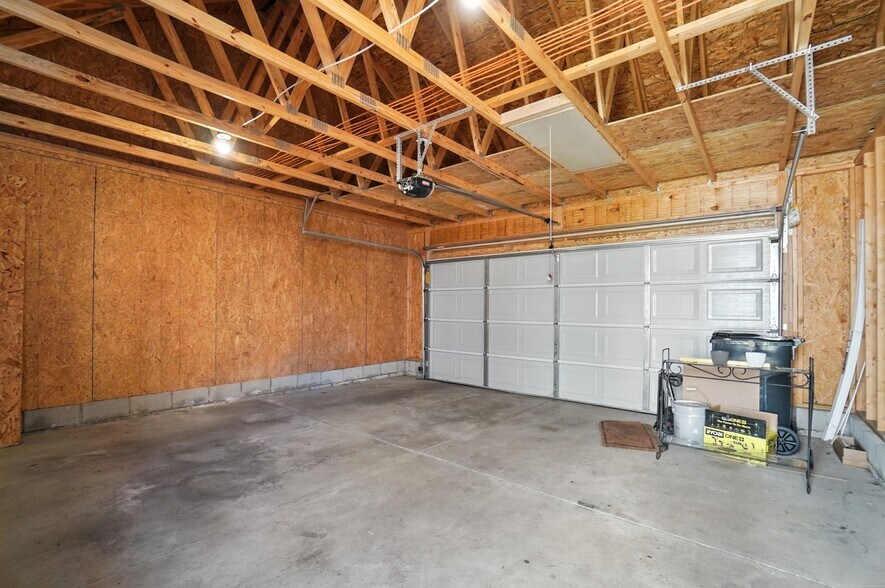 Two car garage with additional storage above - 6169 Needletail Rd