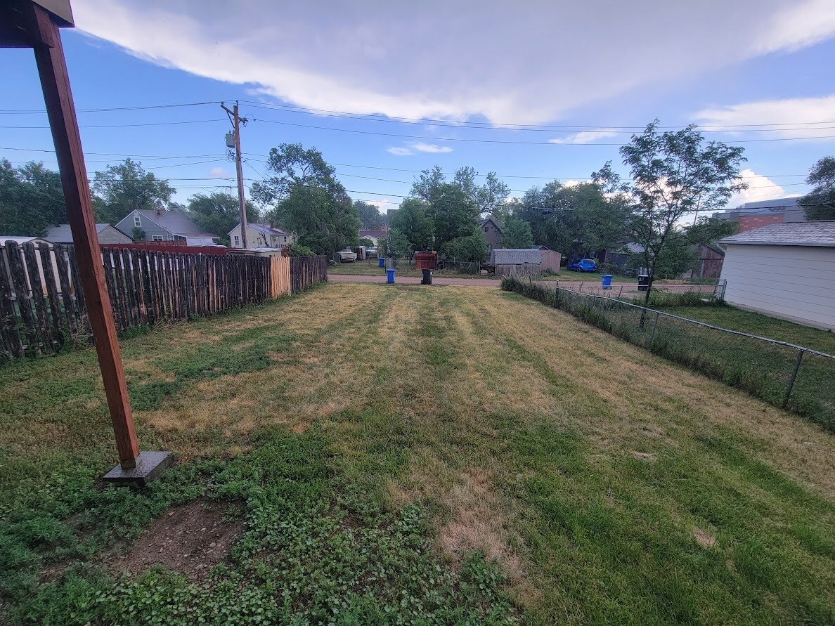 Large back yard with additional parkeing. - 714 Joy Ave