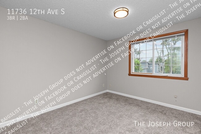 Building Photo - 11736 12th Ave S