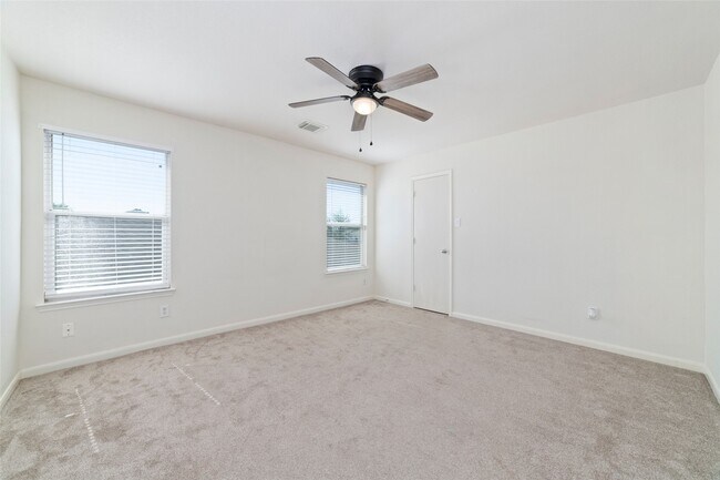 Building Photo - 8418 Village Rose Ln