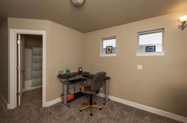 Building Photo - Spacious 4-Bedroom Home with New Paint & Carpet, Fenced Yard