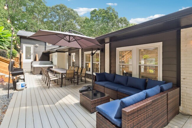 Building Photo - Fully Furnished: Beautiful 4-Bedroom Home ...