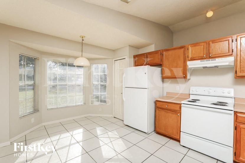 Building Photo - 7594 Groveoak Dr