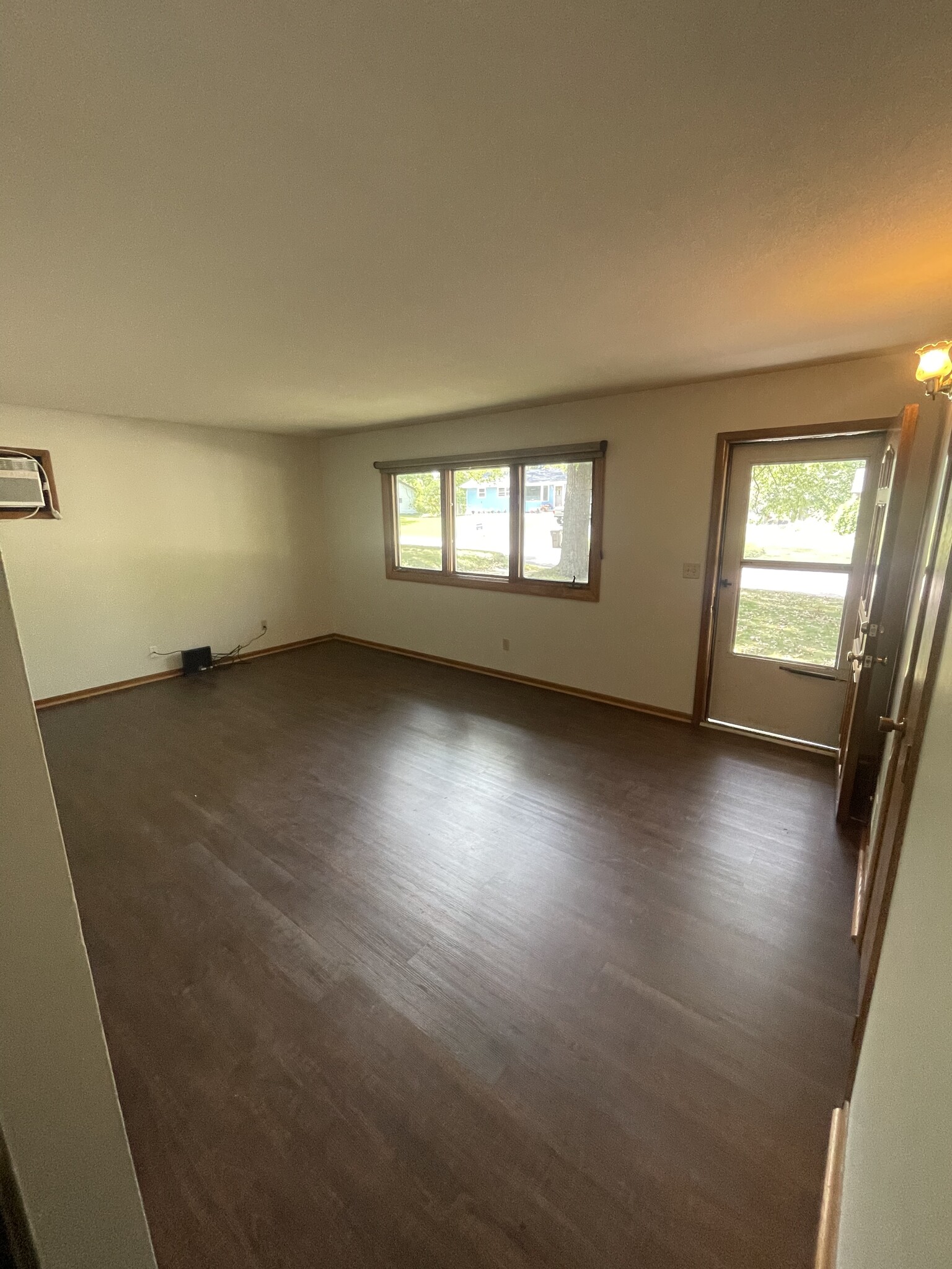 Living room with new flooring - 2630 Norwood Ln N