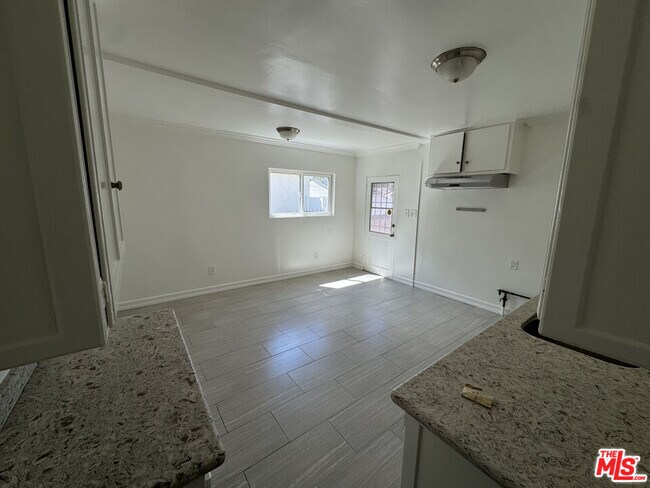 Building Photo - 6003 Bellflower Blvd