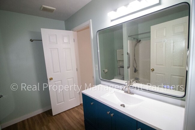 Building Photo - Forest Hills 3 Bed Townhome with Garage, Pond View and Some Utilities Included