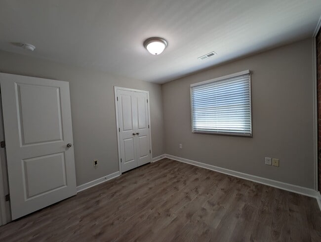 Building Photo - Cozy condo located in the Williamsburg on Commonwealth community minutes from Plaza Midwood!