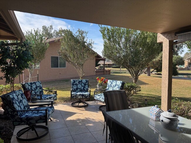 Building Photo - Welcome to this stunning updated 2-bedroom, 2-bathroom home on a lake located in the vibrant comm...