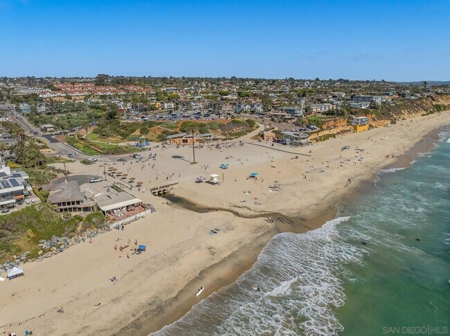 Building Photo - THE BEACH IS YOUR BACKYARD! Light & Bright...