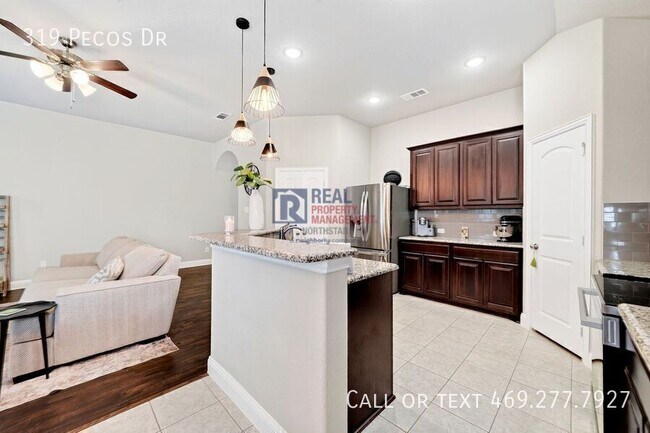 Building Photo - 319 Pecos Dr