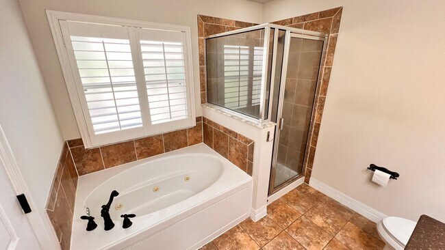 Building Photo - Charming 3-Bedroom Townhome in Oviedo – La...