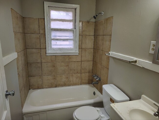 Building Photo - A rare find - 2 bathrooms! Move-in special...