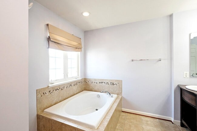 Building Photo - Dog-Friendly 4BR Cherry Hill Townhome with 2-Car Garage