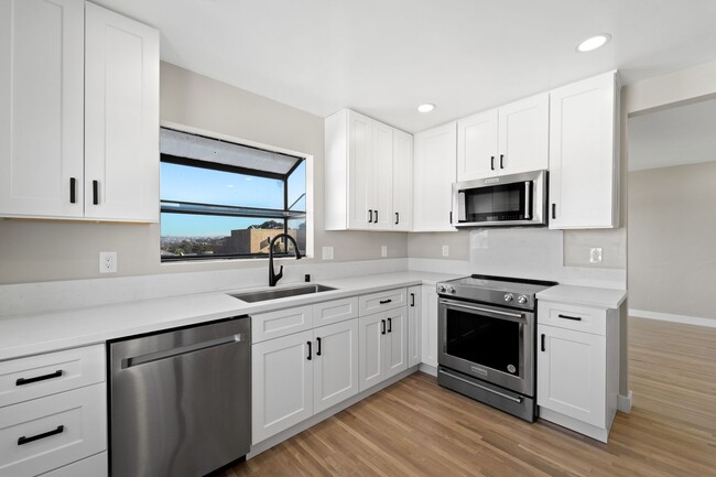 Building Photo - RECENTLY REDUCED! Beautifully Remodeled 3-...