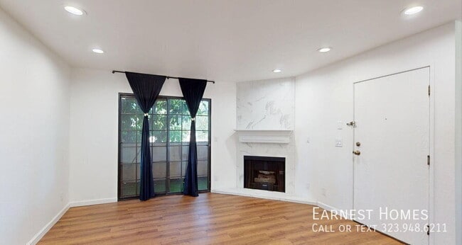 Building Photo - 10220 De Soto Ave