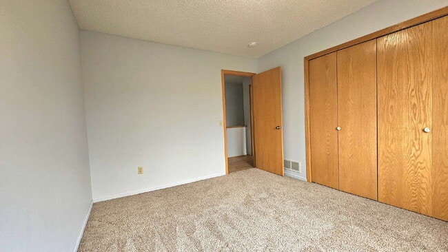 Building Photo - Charming 2-Bed Townhouse Retreat on Harriet Ave  available now.