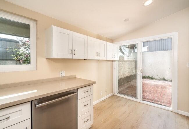 Building Photo - Beautifully Remodeled Tri-Level Condo With...