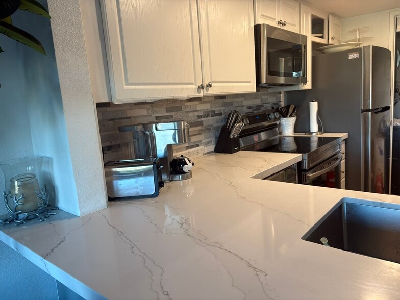 Kitchen Counter View From Eat in Bar - 78129 Crimson Ct