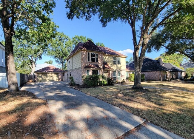 Building Photo - Amazing Cottage Charm Designer Home with Lush Landscaping, Sprinkler System, New Insulated Window...