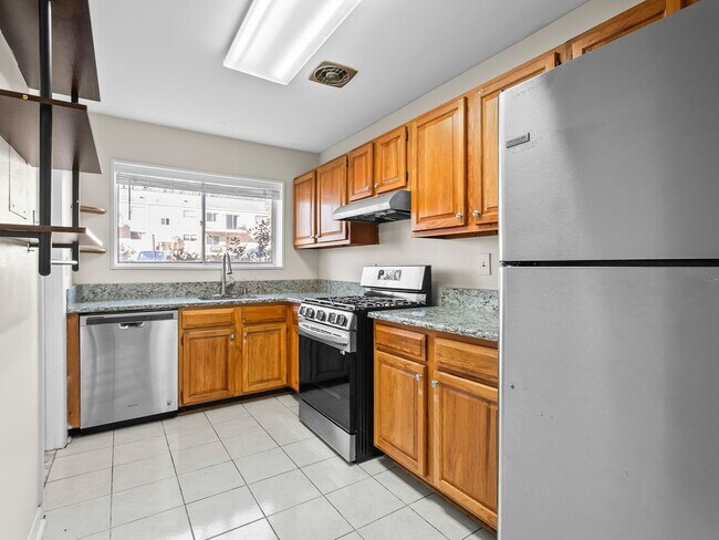 Building Photo - Commuter’s Dream! Large 2BR/2BA Condo Steps from Metro – All Utilities Included!