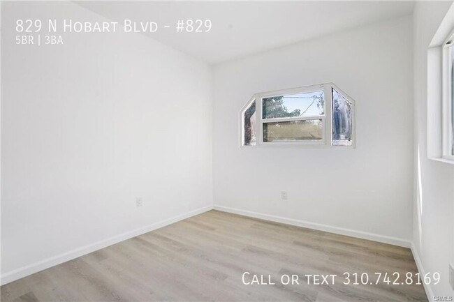 Building Photo - Luxe Living at 825 N. Hobart Blvd. – Where...