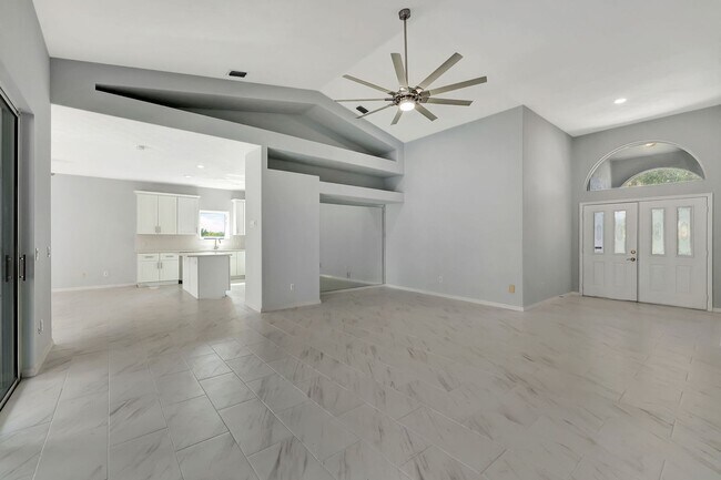 Building Photo - A BOATER'S PARADISE WITH THIS STUNNING 3 BEDROOM, 2 BATH WATERFRONT POOL HOME W/DOCK & BOAT LIFT ...