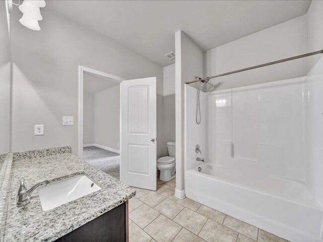 Building Photo - Spacious 4BR Home with Fenced Yard & Community Pool