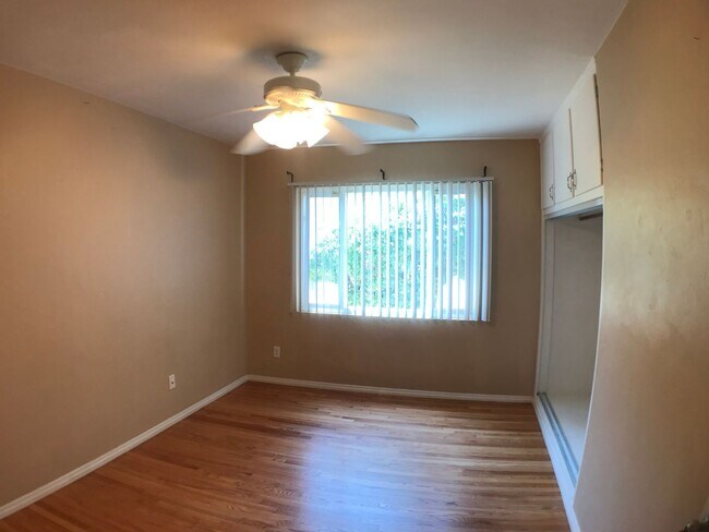 Building Photo - BEAUTIFUL WOOD FLOORS IN THIS- 5 BED 2 BATHROOM- Includes maid service