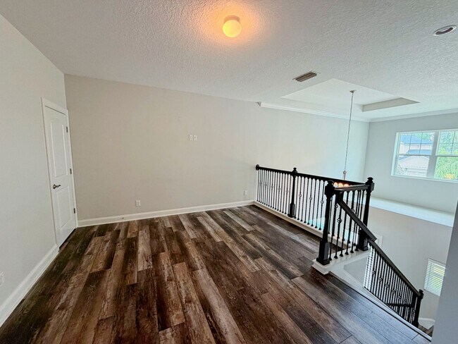 Building Photo - Immaculate 5 Bedroom, 3.5 Bathroom luxury home located within a prestigious gated community