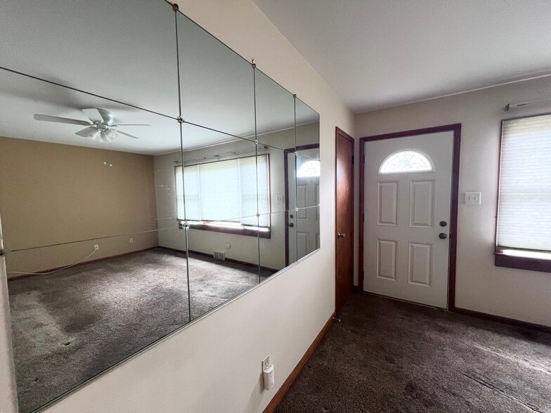 Living room With huge mirror and big window - 18 Ridgecrest Ave